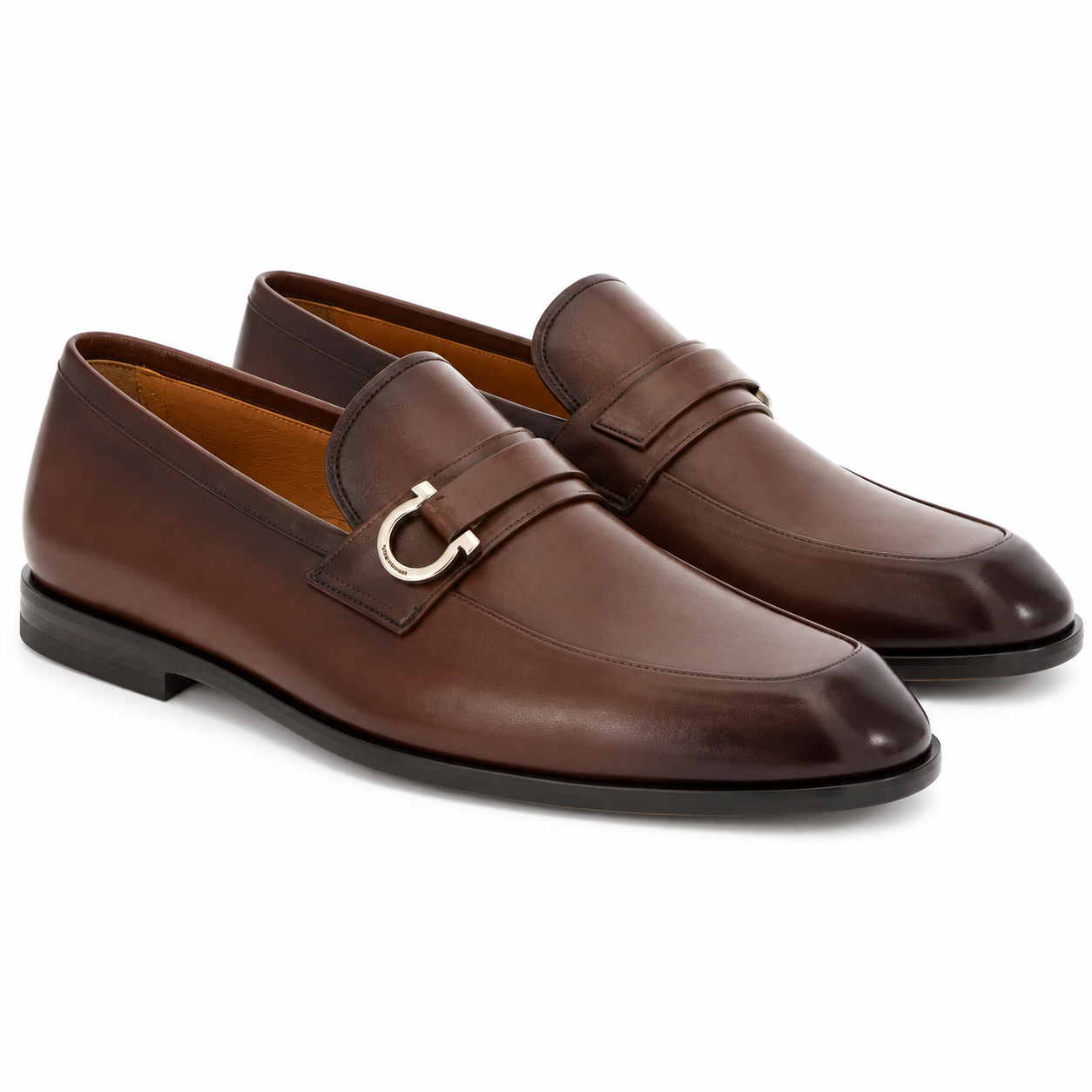 Men's brown leather buckle loafers, pair shown side on